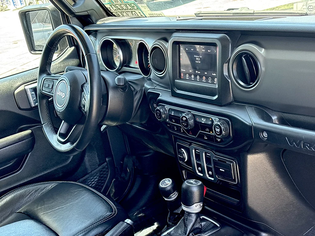Used 2022 Granite Crystal Metallic Clear Coat Jeep Sport S image 26