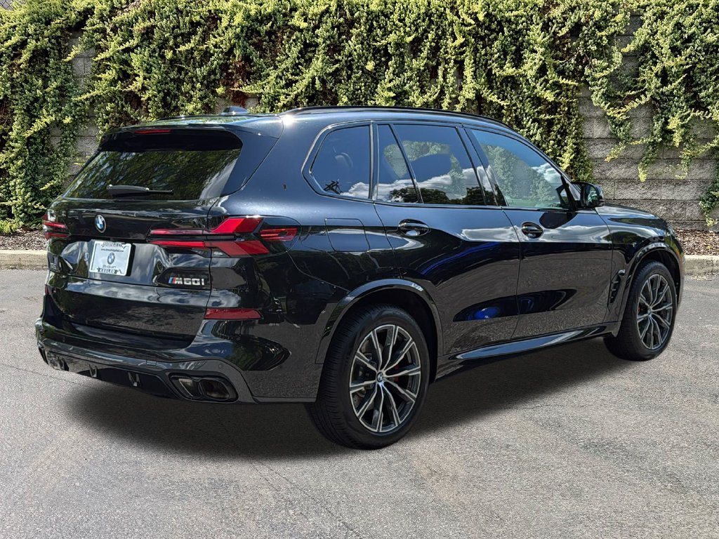 Used 2026 Black Sapphire Metallic BMW M60i image 4
