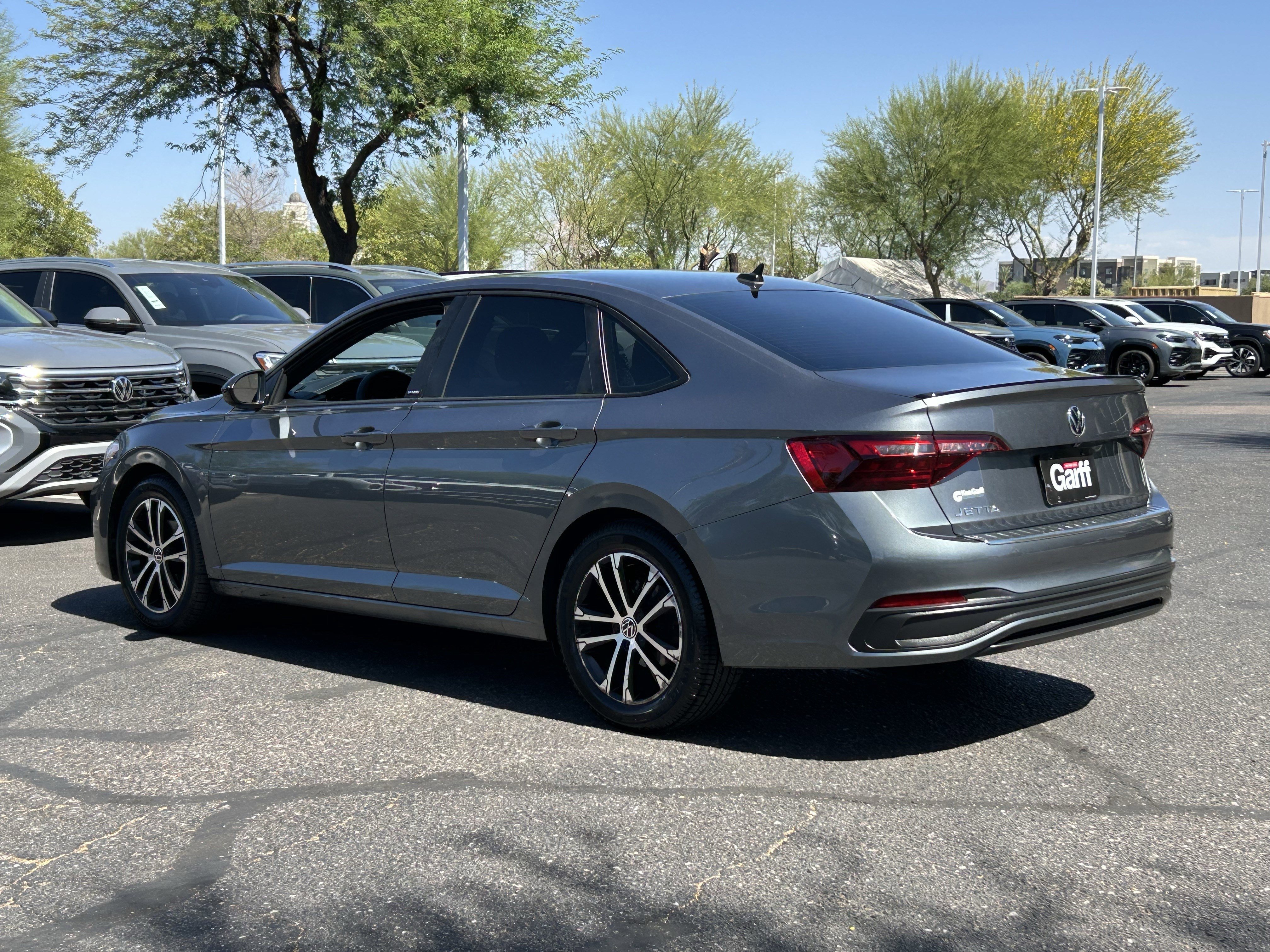 Used 2023 Platinum Gray Metallic Volkswagen Sport image 3