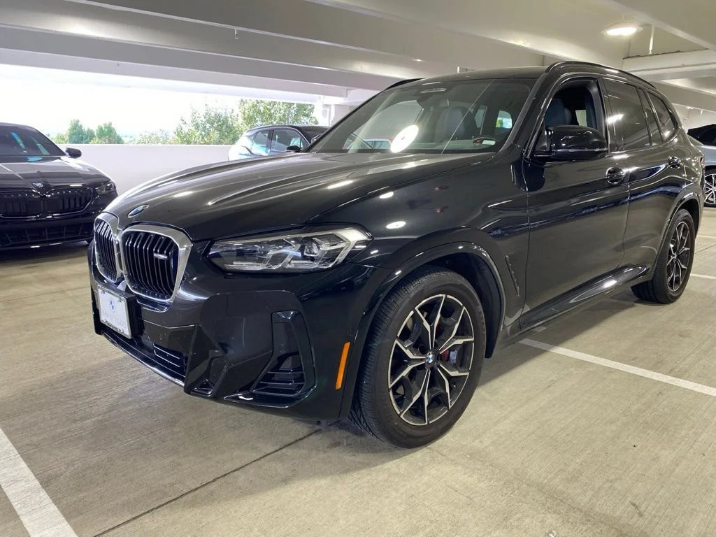 Used 2022 Black Sapphire Metallic BMW M40i image 1