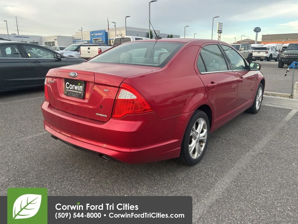 Used 2012 Red Candy Metallic Tinted Clearcoat Ford SE image 9
