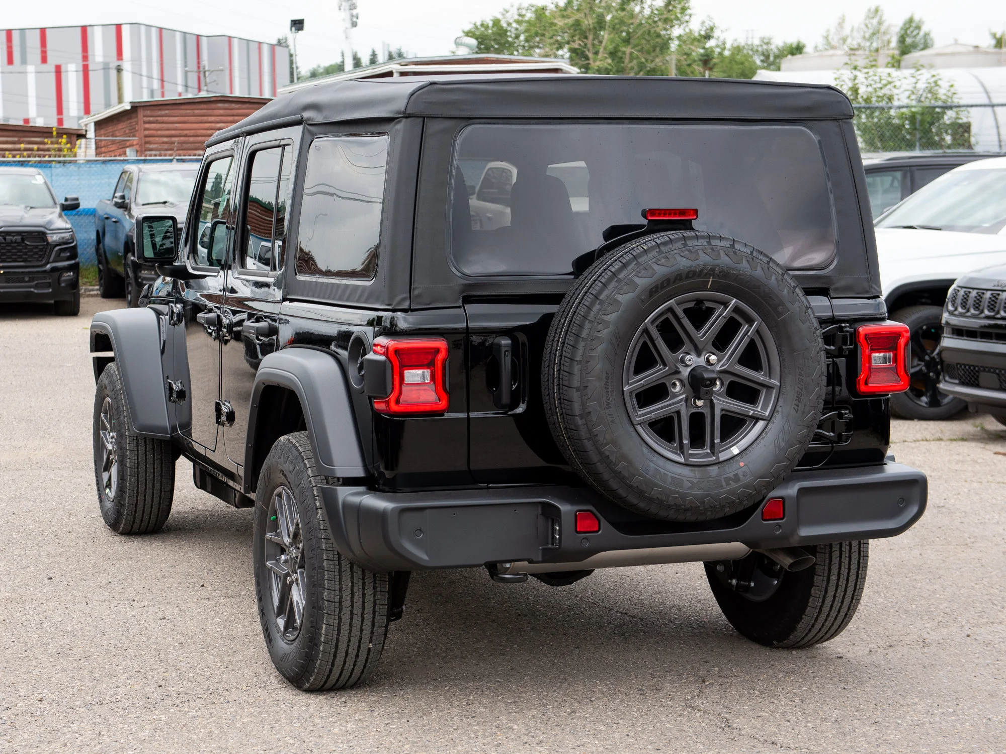 New 2026 Black Jeep Sport S* image 3