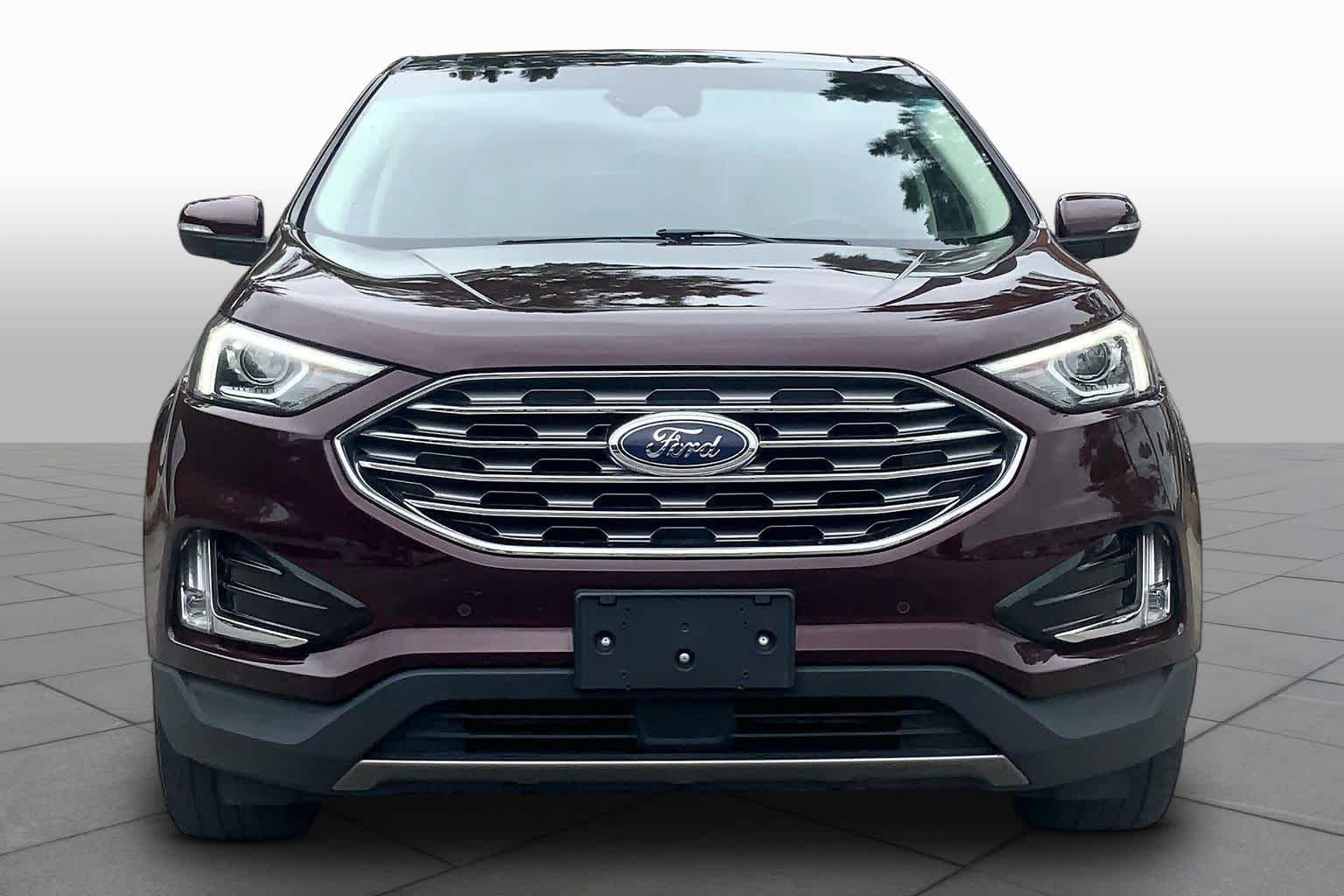 Used 2021 Burgundy Velvet Metallic Tinted Clearcoat Ford Titanium image 4