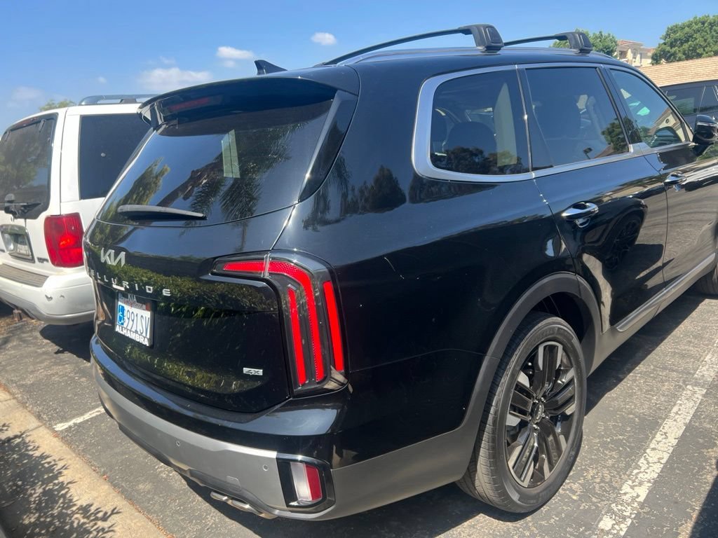 Used 2023 Ebony Black Kia SX Prestige image 3