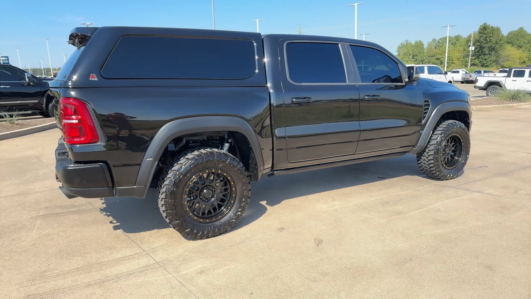 Used 2025 Diamond Black Crystal Pearlcoat Ram RHO image 9