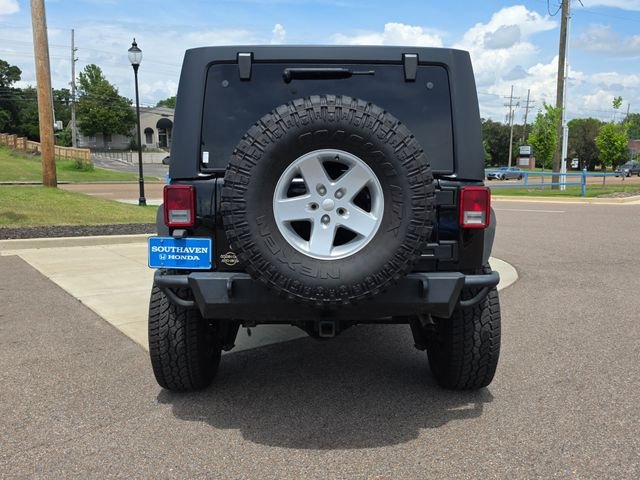 Used 2016 Black Clearcoat Jeep Unlimited Sport image 4