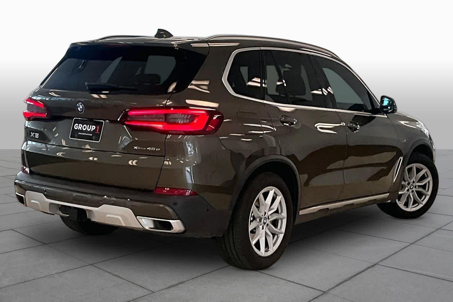 Used 2023 Manhattan Green Metallic BMW xDrive45e image 12