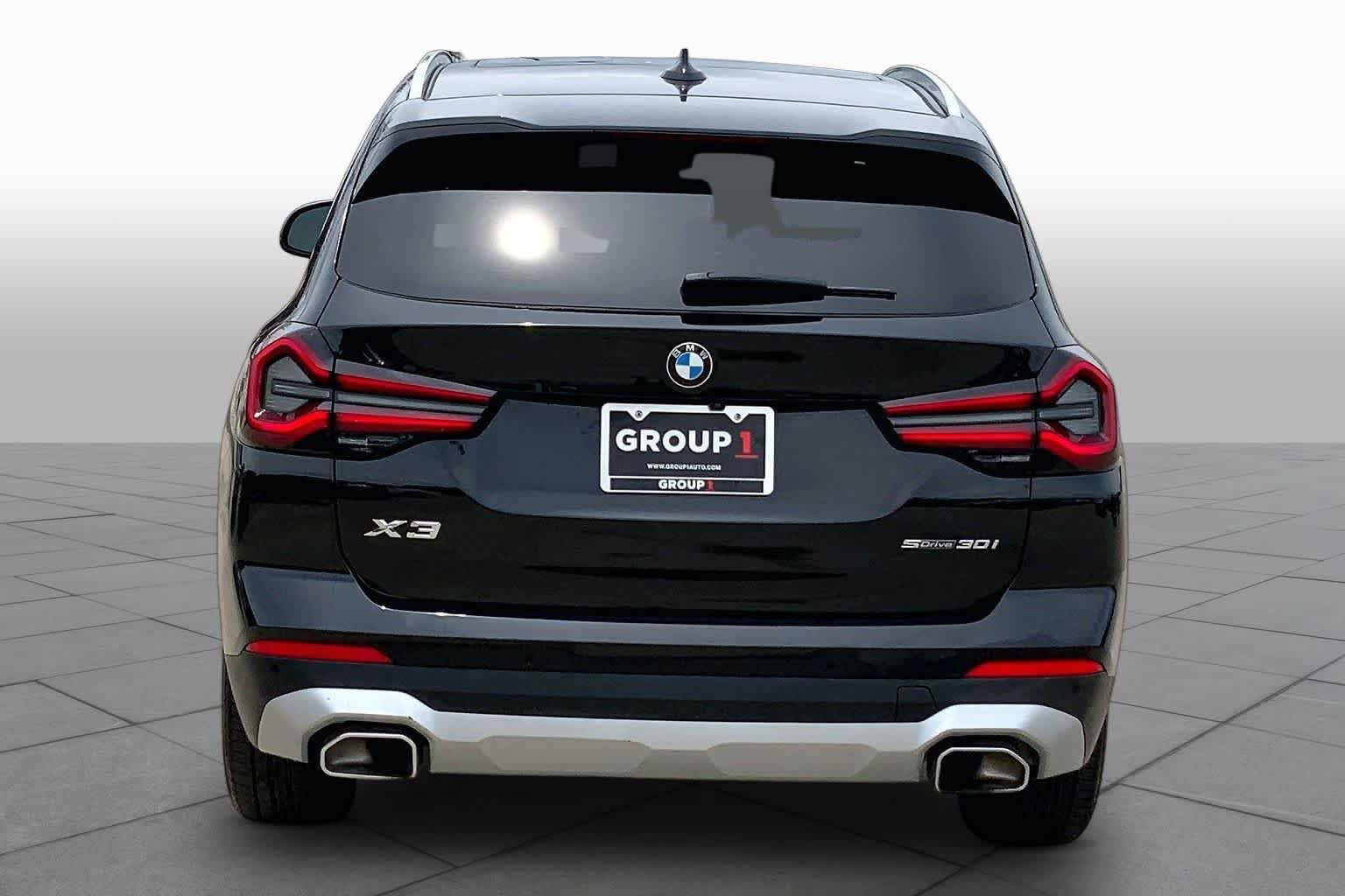 Used 2024 Black Sapphire Metallic BMW sDrive30i image 5