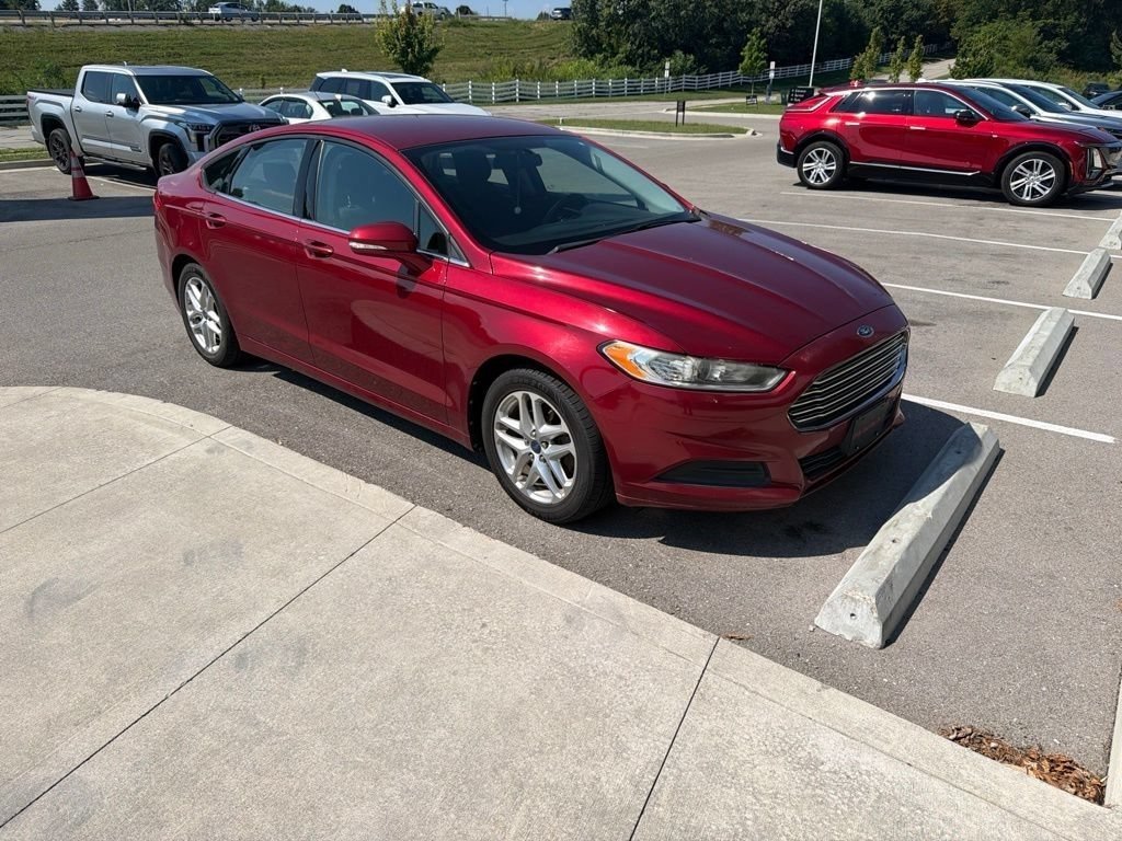 Used 2013 Ruby Red Metallic Ford SE image 2