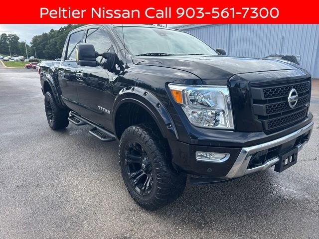 Used 2021 Black Nissan SV image 1