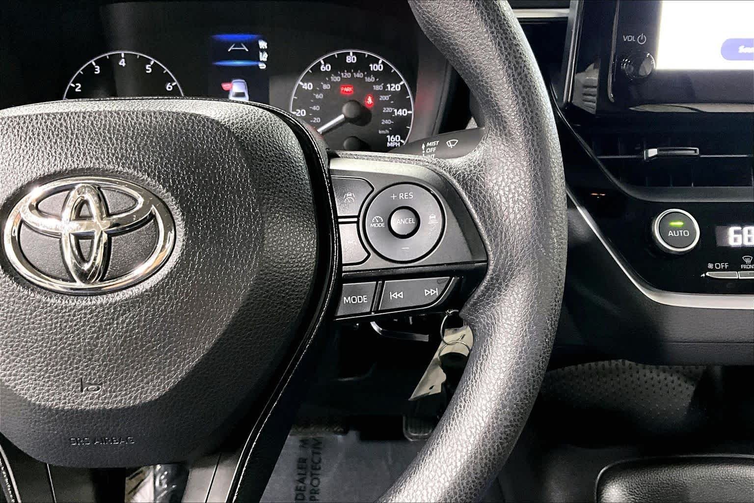 Used 2024 Classic Silver Metallic Toyota LE image 25