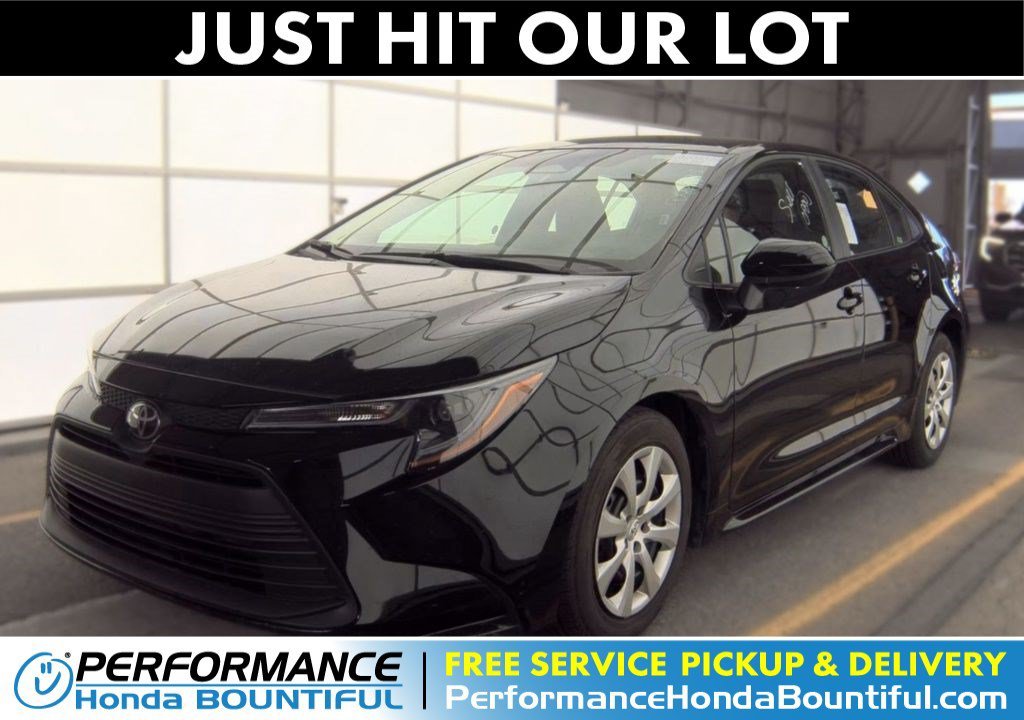Used 2026 Midnight Black Metallic Toyota LE image 1