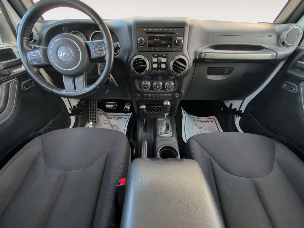Used 2015 White Jeep Unlimited Sport image 10