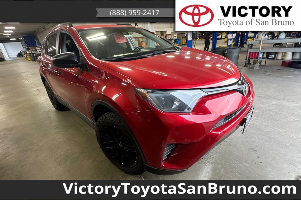 Used 2017 Red Toyota LE image 1