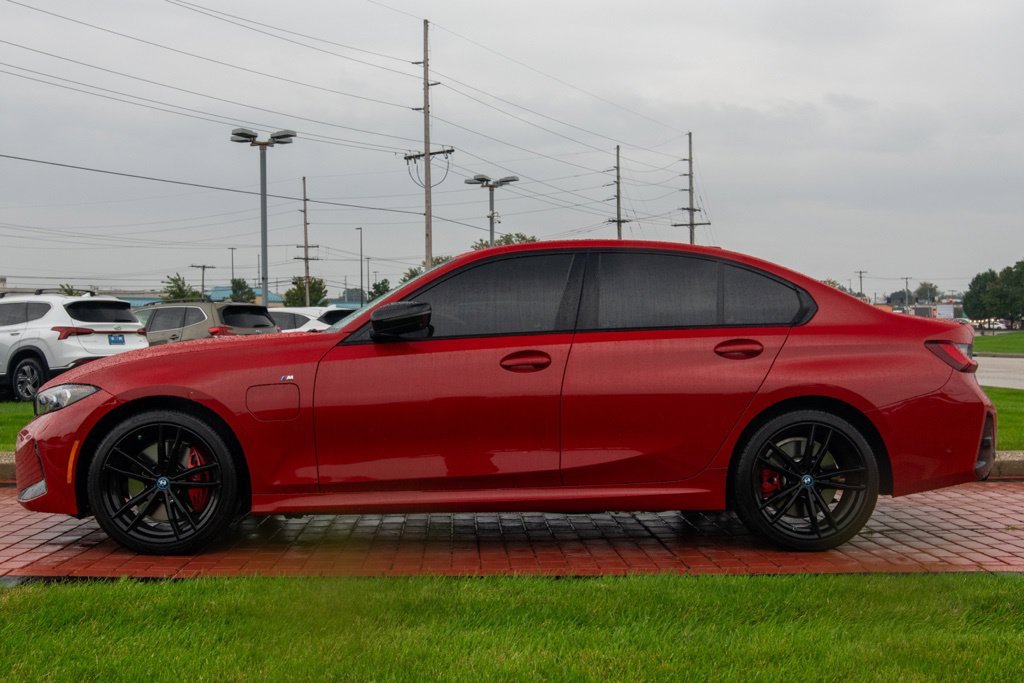 Used 2024 Melbourne Red Metallic BMW 330e xDrive image 3