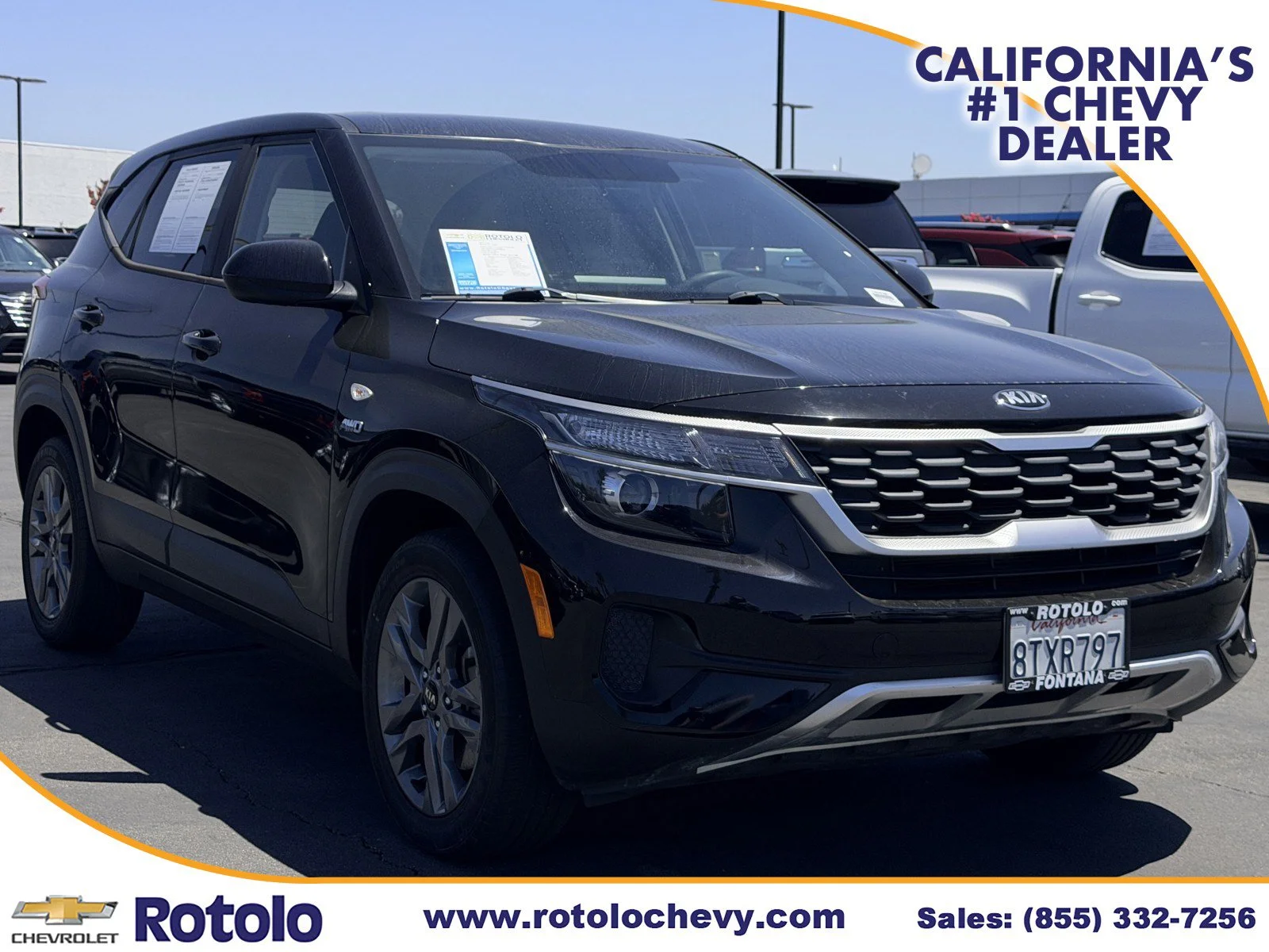 Used 2021 Cherry Black Kia LX image 1