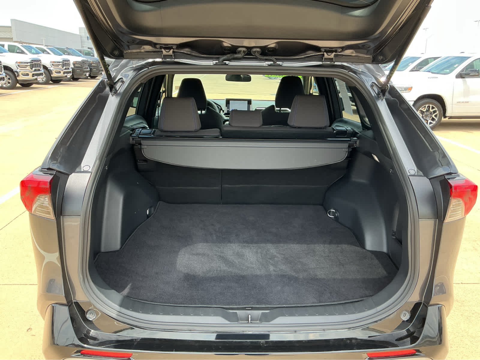 Used 2025 Magnetic Gray Metallic Toyota Hybrid SE image 18