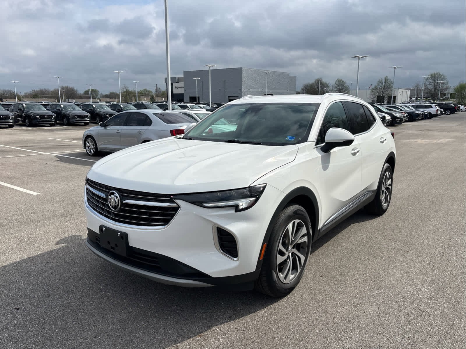 Used 2023 Buick Envision Essence with VIN LRBFZPR44PD066373 for sale in Kansas City