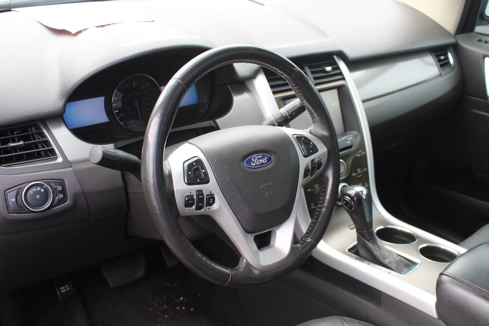 Used 2011 Tuxedo Black Metallic Ford SEL image 8