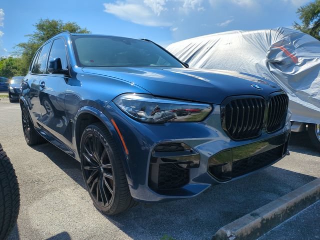 Used 2023 Blue BMW sDrive40i image 1