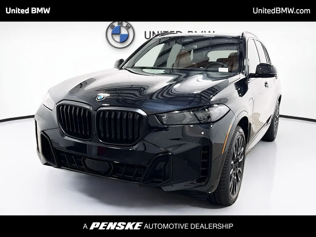 New 2026 Black Sapphire Metallic BMW xDrive50e image 1