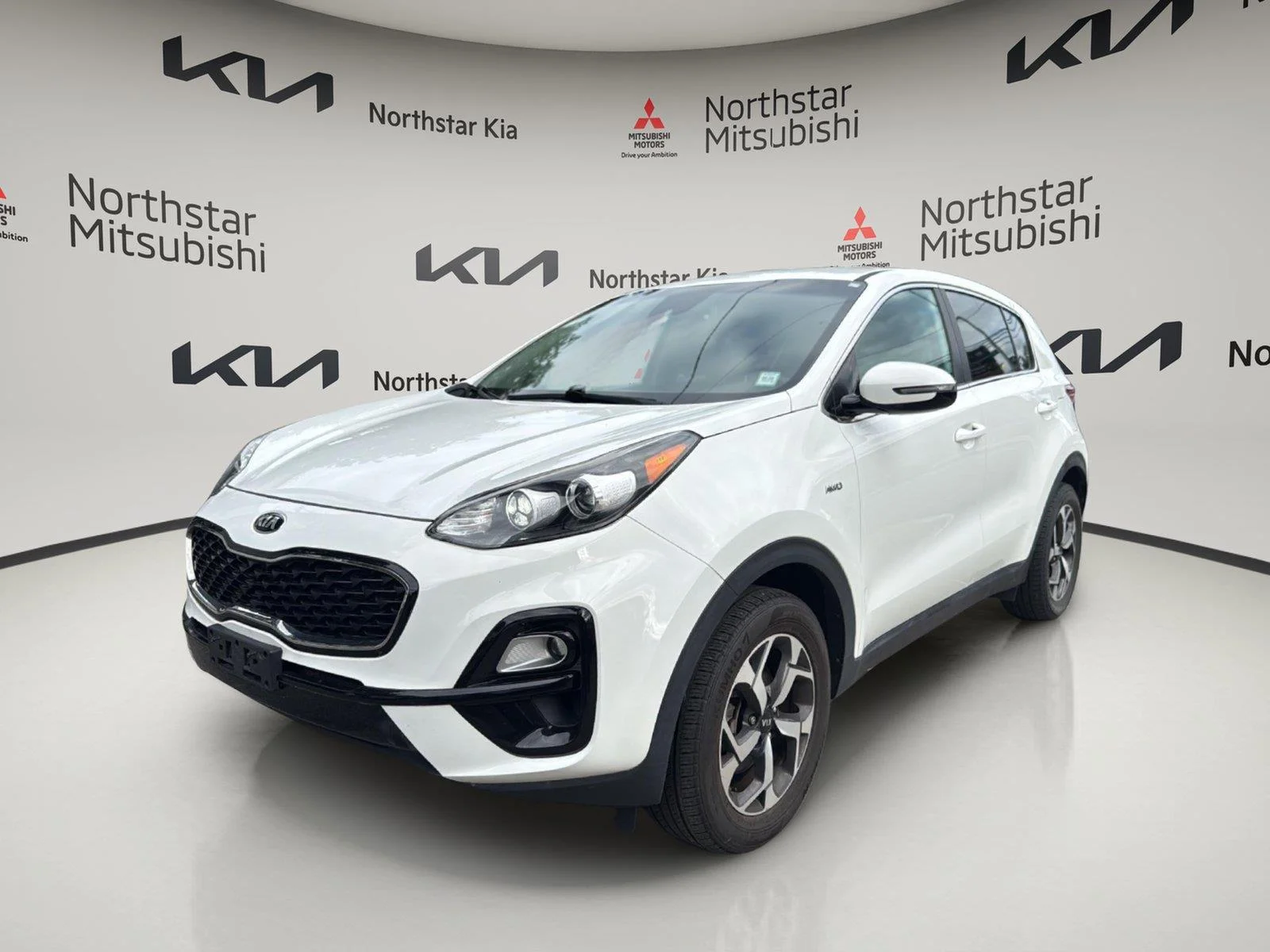 Used 2020 Clear White Kia LX image 1