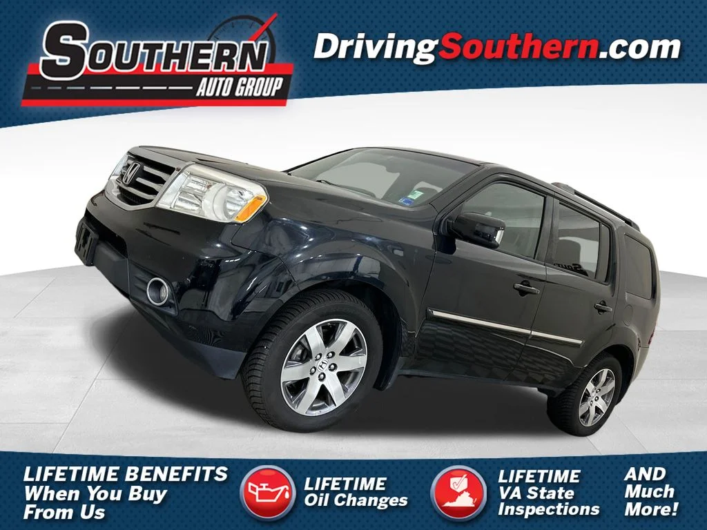 Used 2013 Black Honda Touring image 1