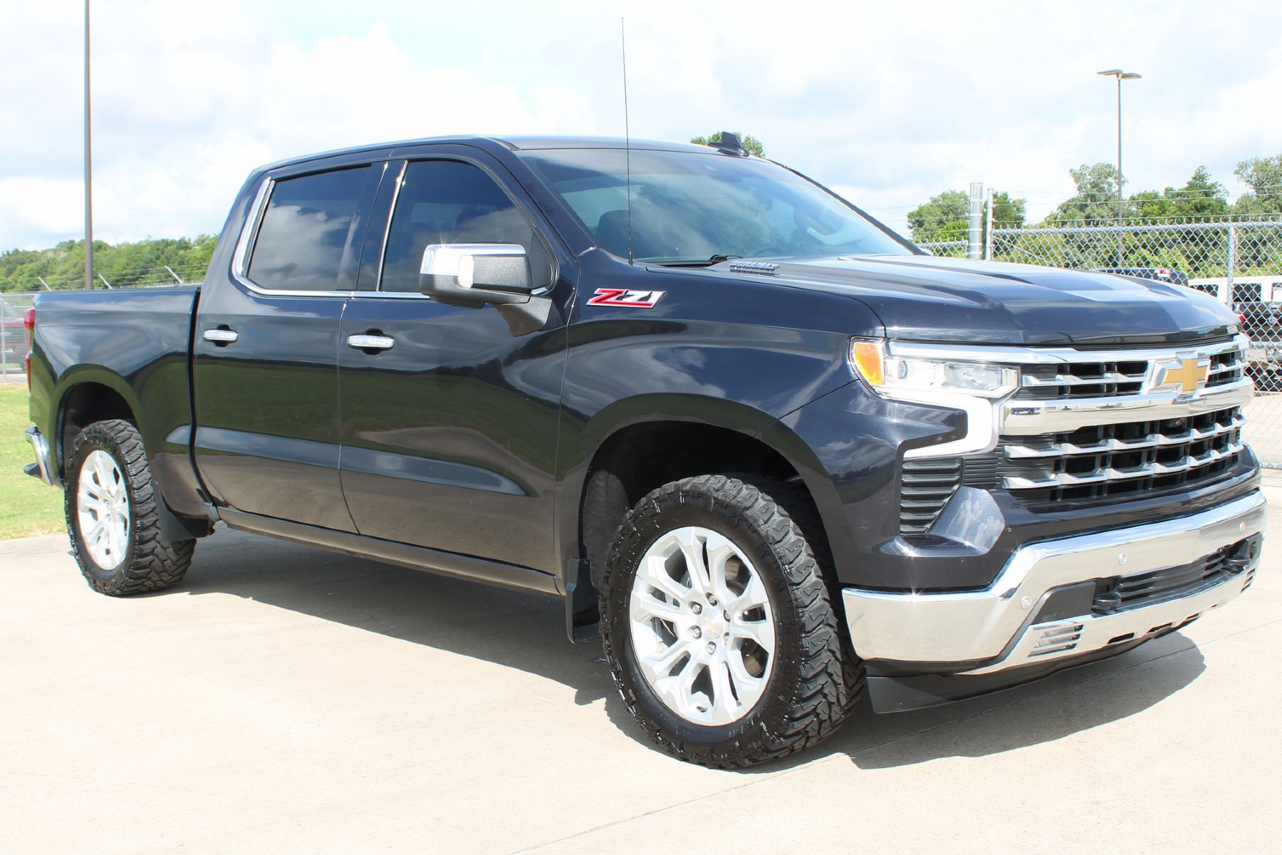 Used 2023 Dark Ash Metallic Chevrolet 4WD Crew Cab 147 LTZ image 30