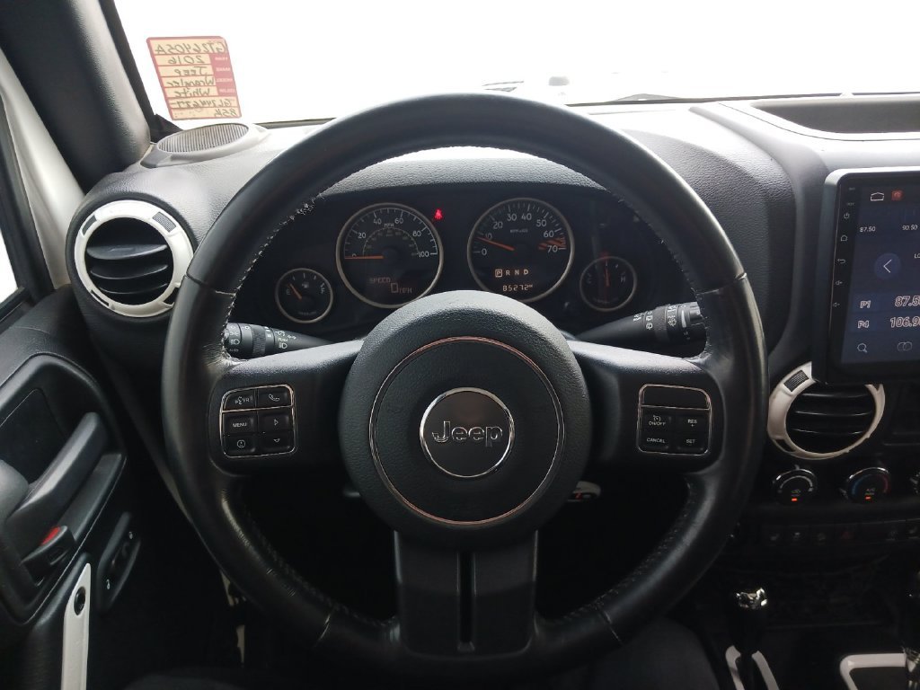Used 2016 White Jeep Unlimited Sahara image 17
