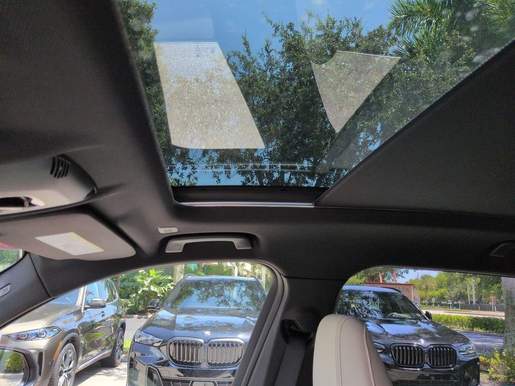 New 2026 Vegas Red Metallic BMW xDrive28i image 20