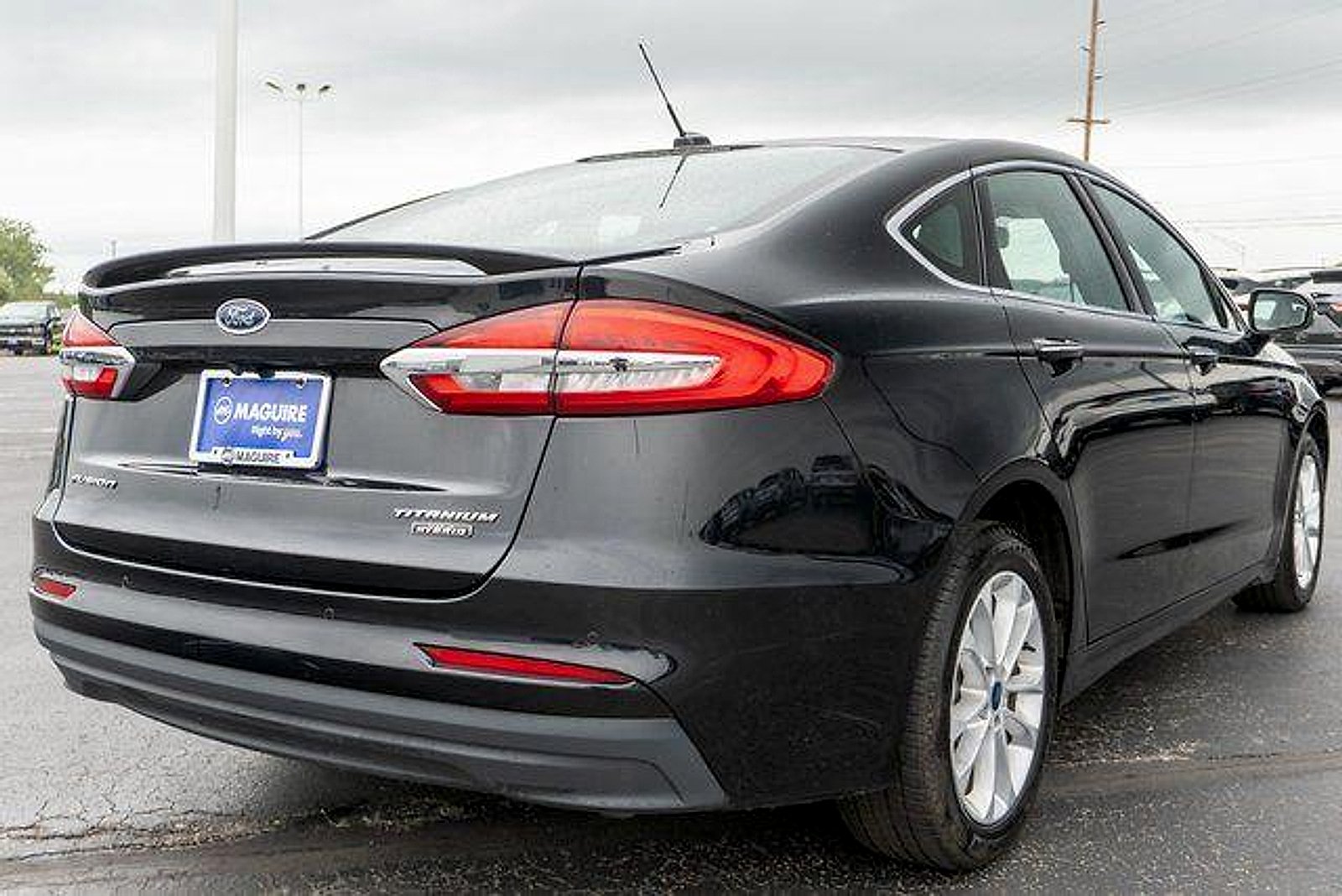 Used 2020 Agate Black Metallic Ford Plug-In Hybrid Titanium image 6