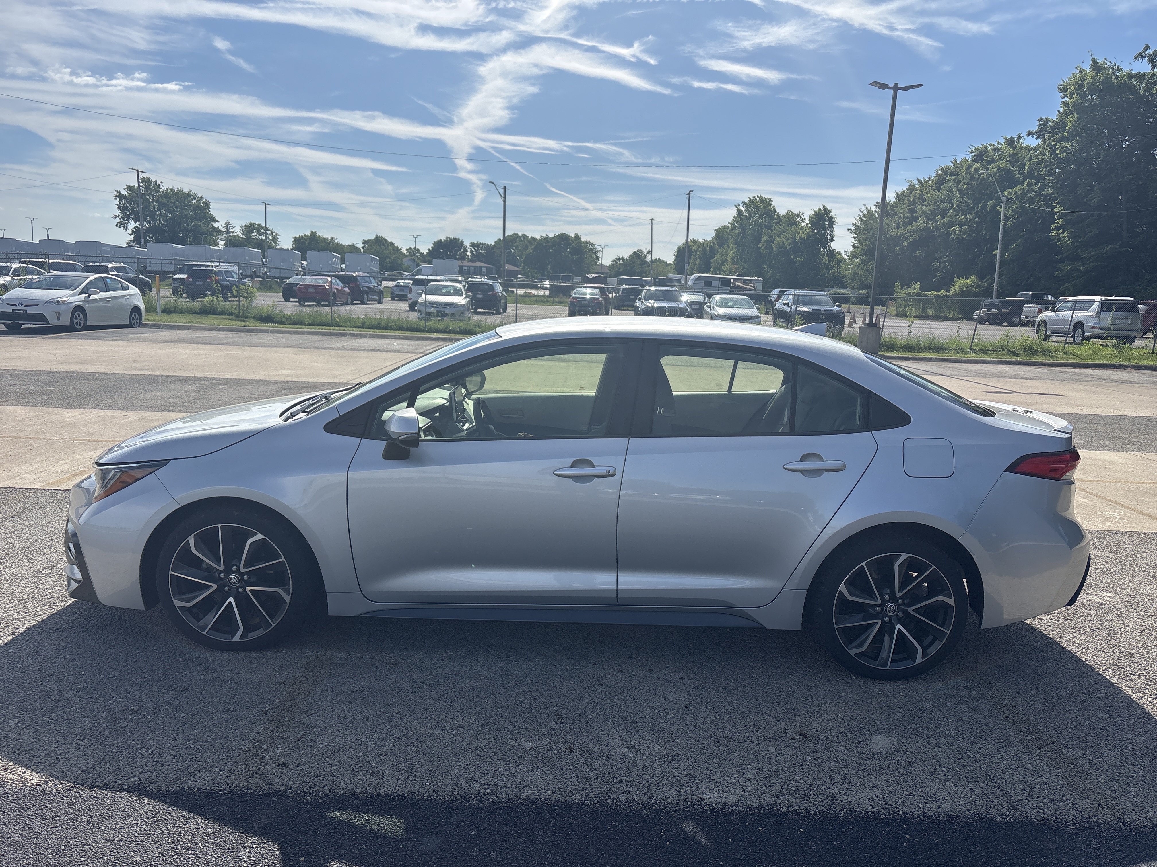 Used 2020 Classic Silver Metallic Toyota SE image 1