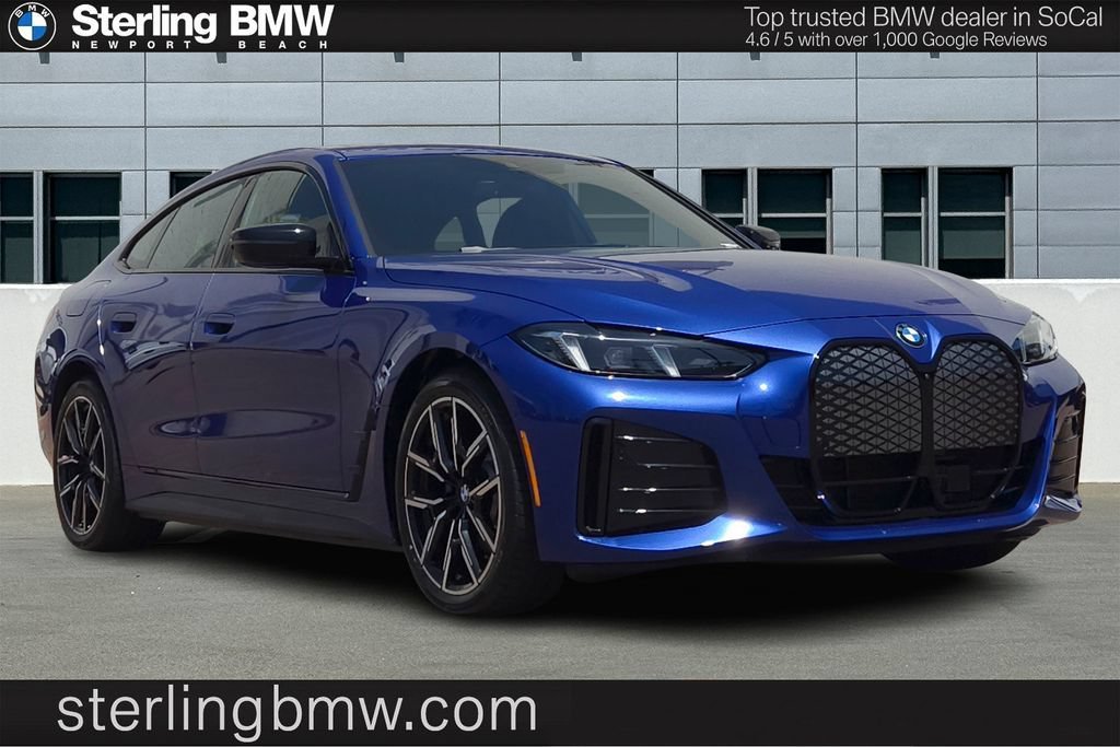 New 2026 Portimao Blue Metallic BMW eDrive40 image 1