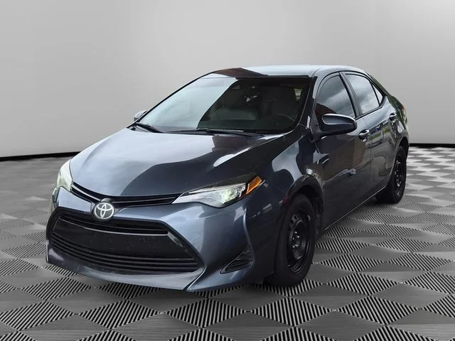 Used 2019 Gray Toyota LE image 1