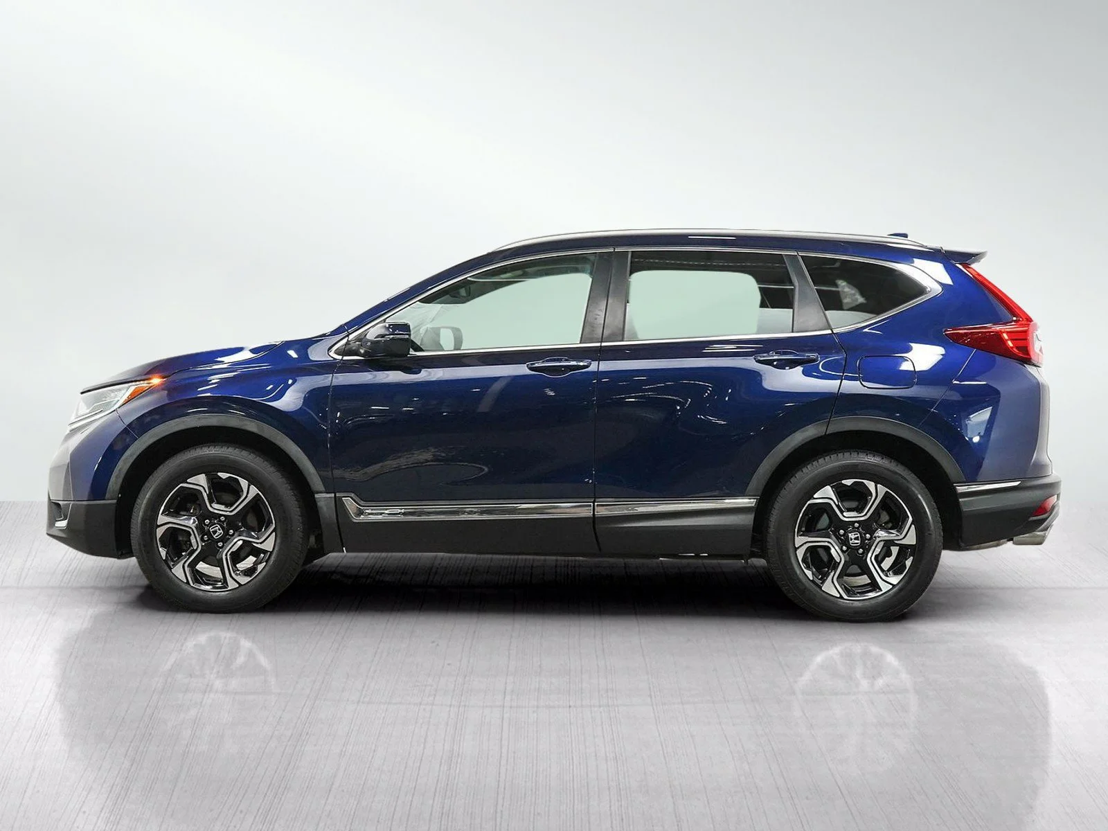 Used 2017 Honda CR-V Touring with VIN 5J6RW2H91HL050124 for sale in Burnsville, Minnesota