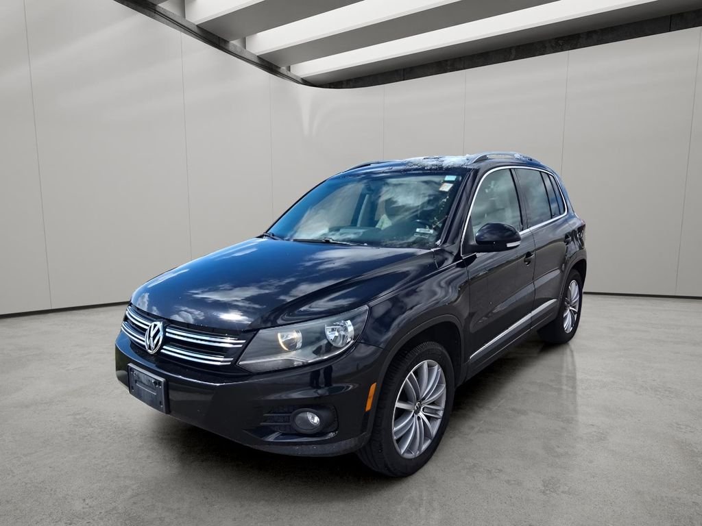 Used 2013 Deep Black Metallic Volkswagen SE image 1