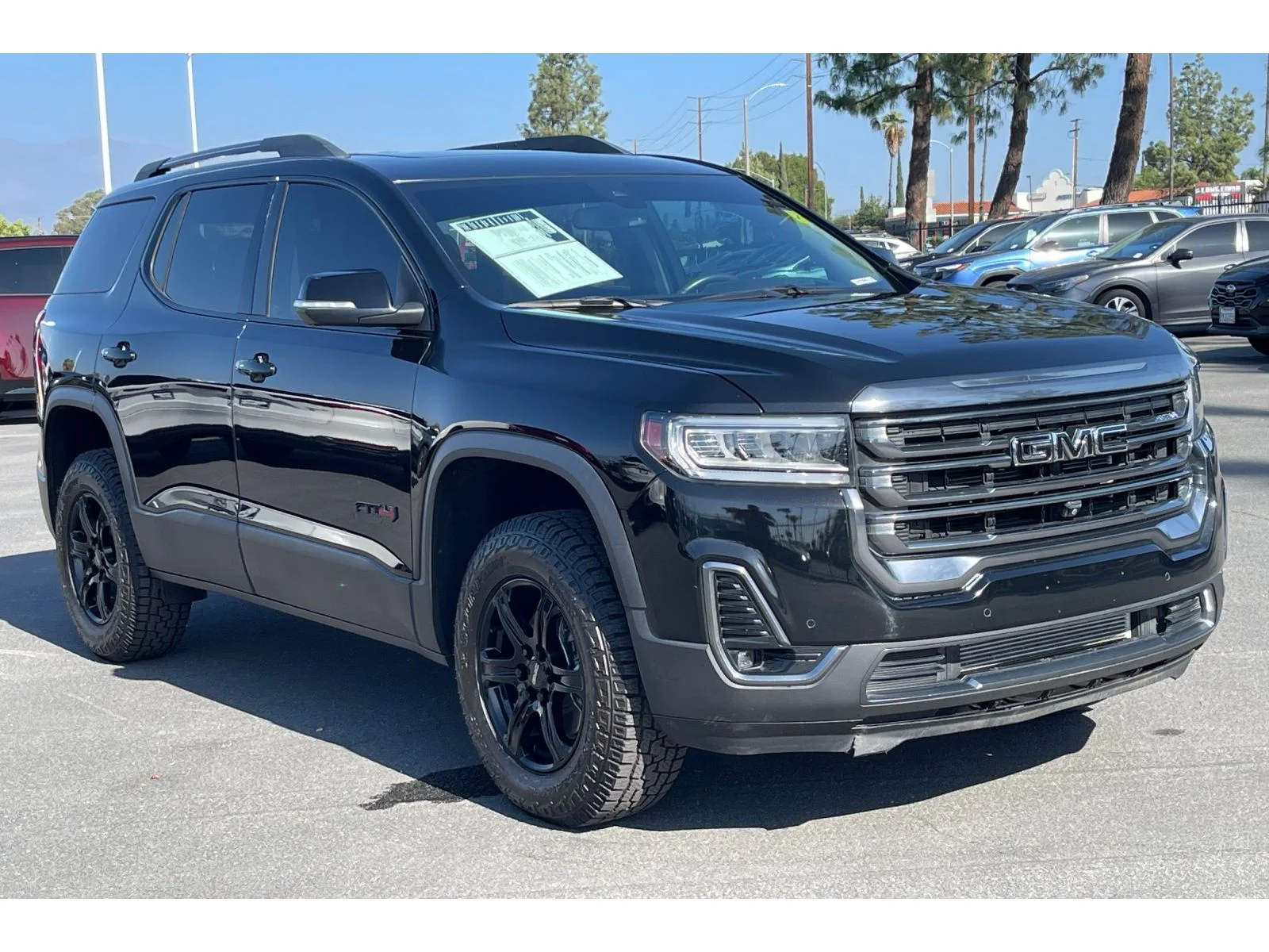 Used 2021 Ebony Twilight Metallic GMC AT4 image 9