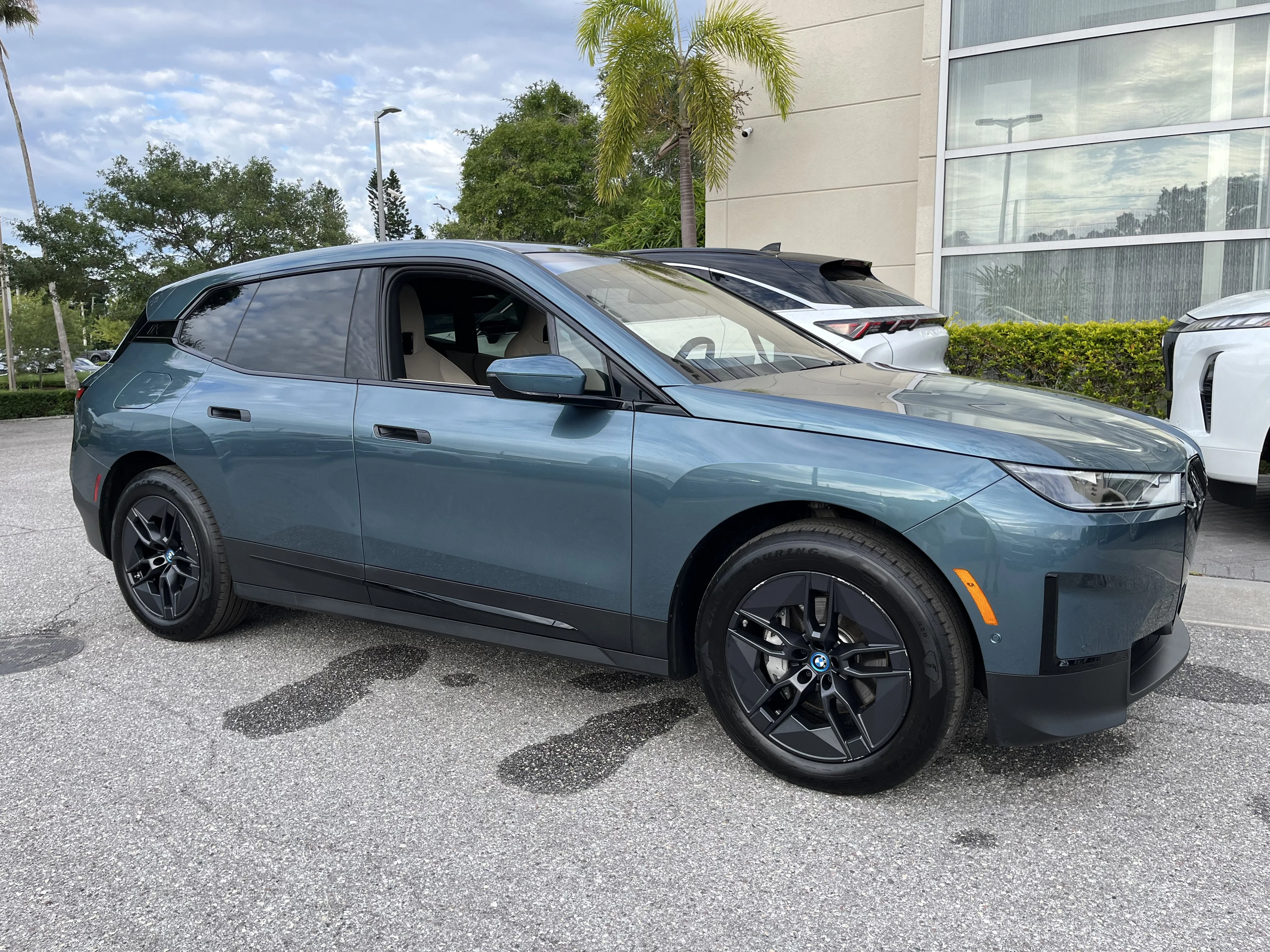 Used 2025 Blue Ridge Mountain Metallic BMW xDrive50 image 12