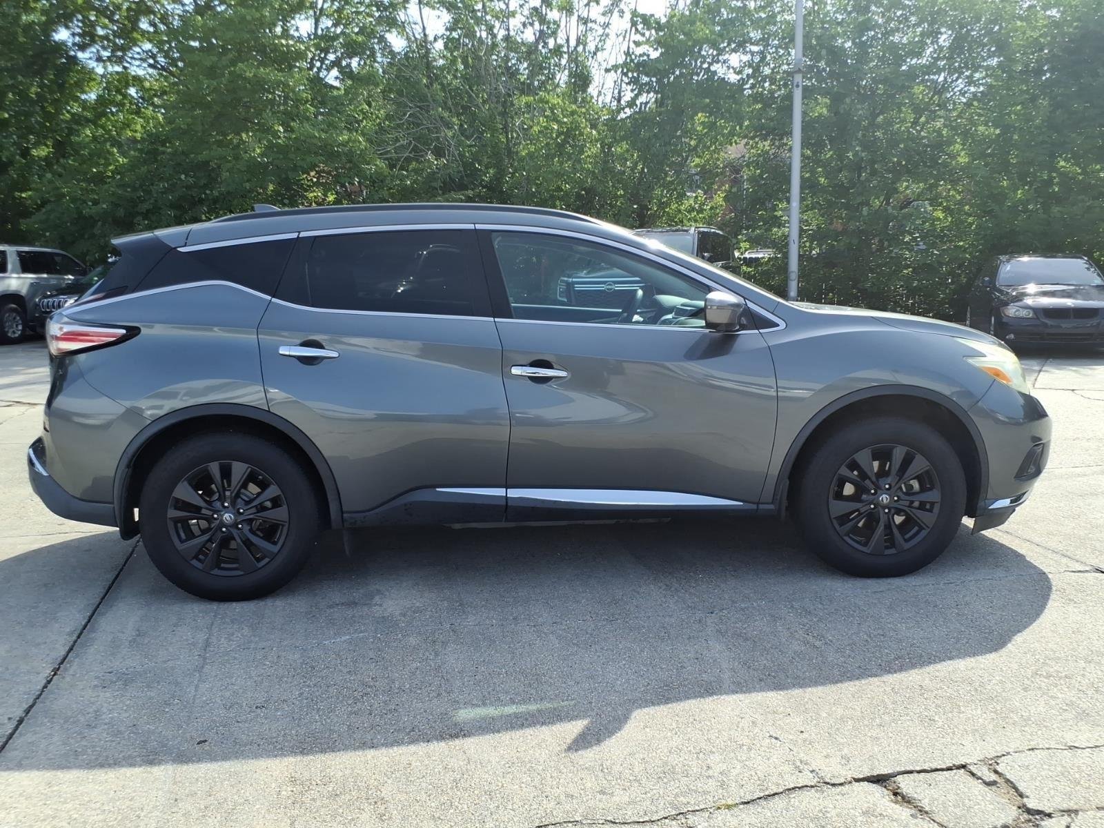Used 2017 Gun Metallic Nissan SV image 6