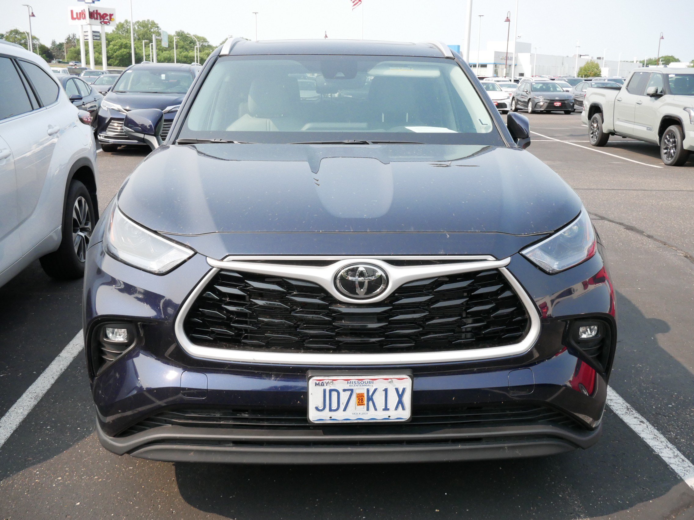 Certified 2026 Toyota Highlander XLE with VIN 5TDKDRBH1TS609040 for sale in Brooklyn Center, Minnesota