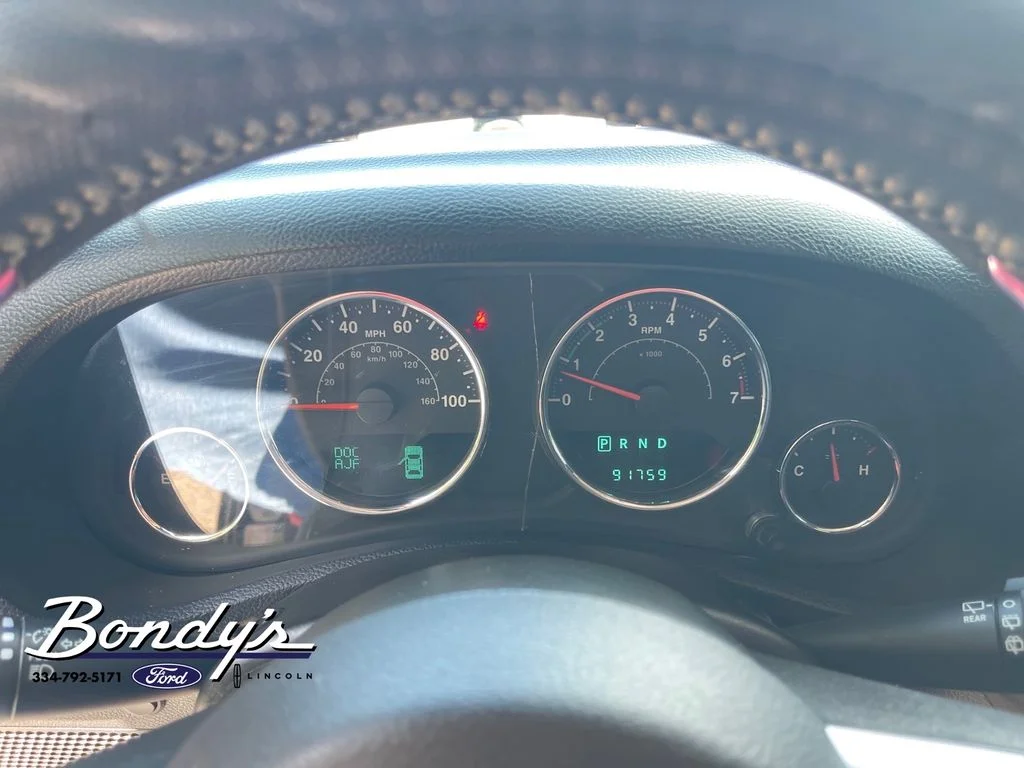 Used 2013 Black Clearcoat Jeep Unlimited Sport image 4