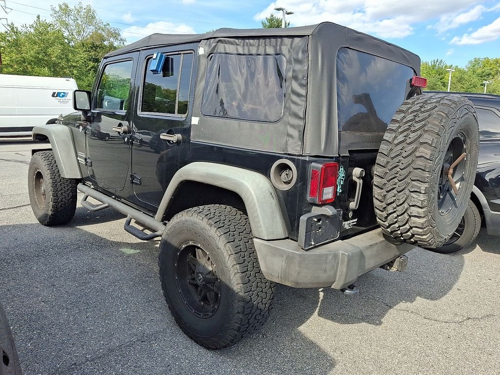 Used 2015 Black Jeep Unlimited Sport image 4
