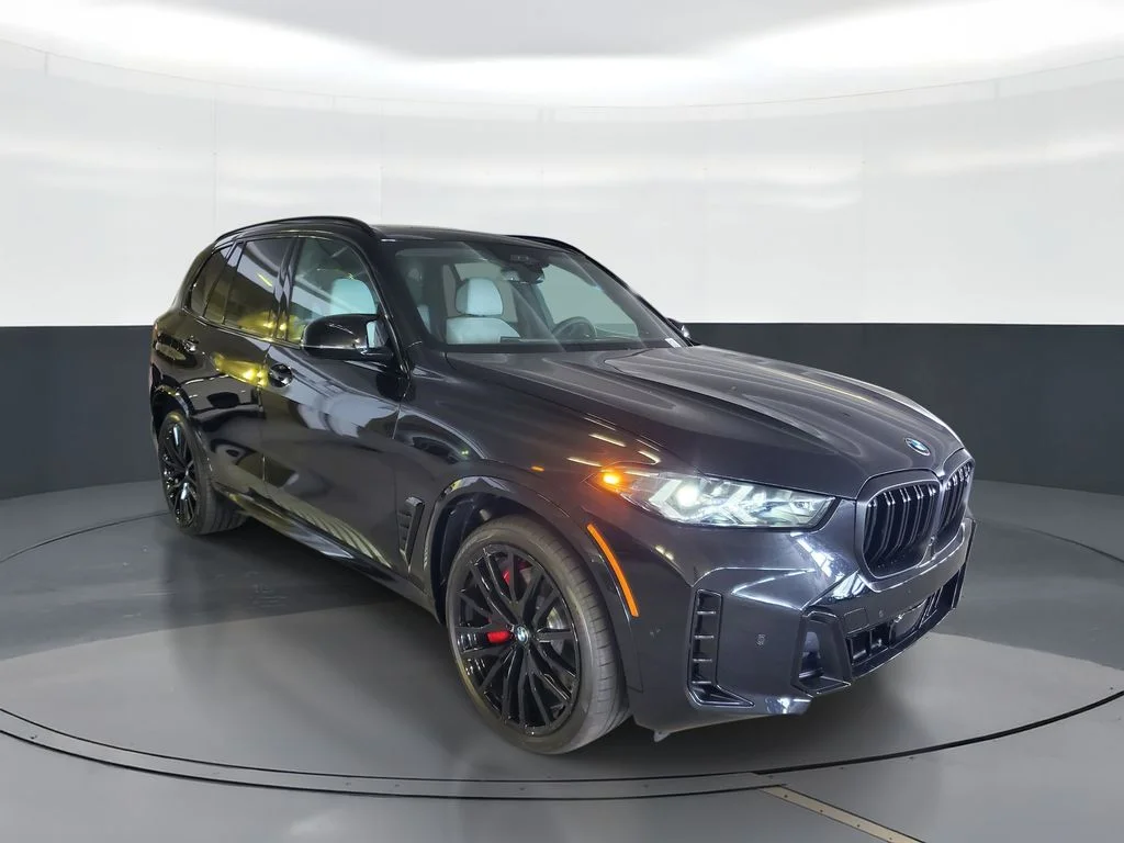 New 2026 Black Sapphire Metallic BMW M60i image 2