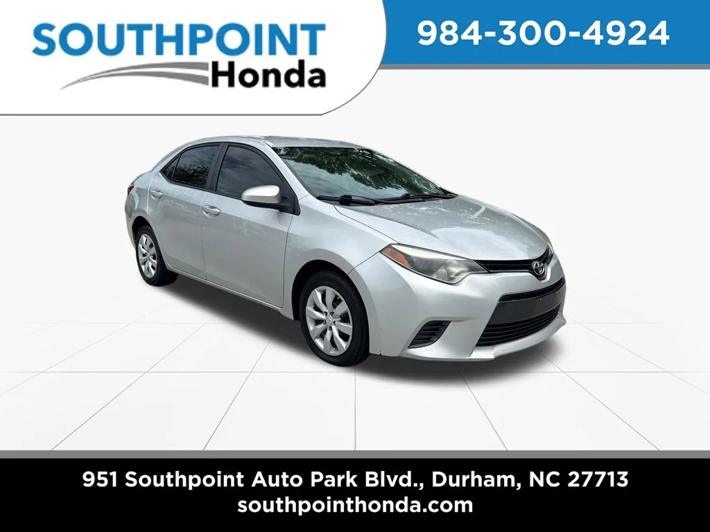 Used 2016 Classic Silver Metallic Toyota LE image 1