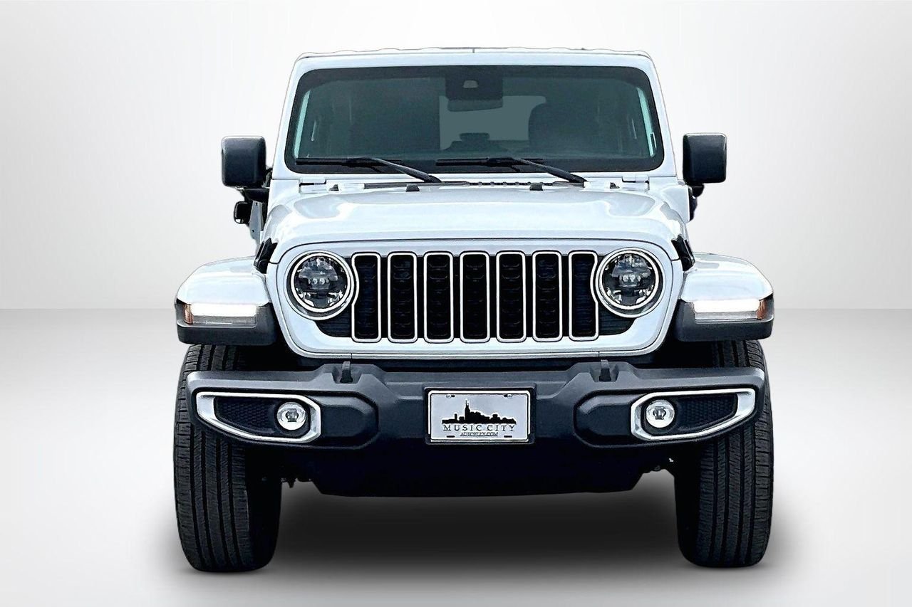 Used 2025 Bright White Clearcoat Jeep Sahara 4xe image 2