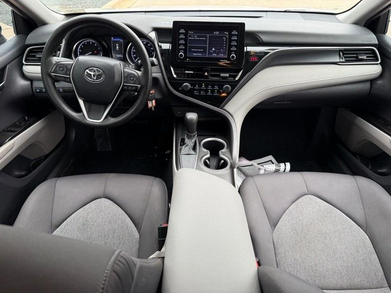 Used 2021 Super White Toyota LE image 13