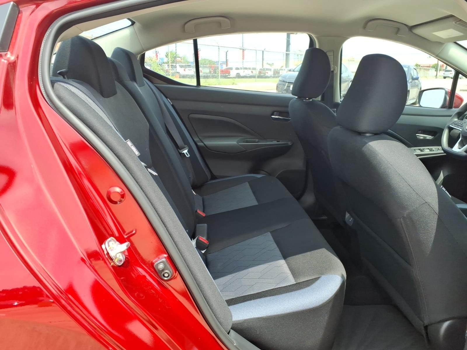 2025 Nissan Versa SV Red at Robbins Nissan