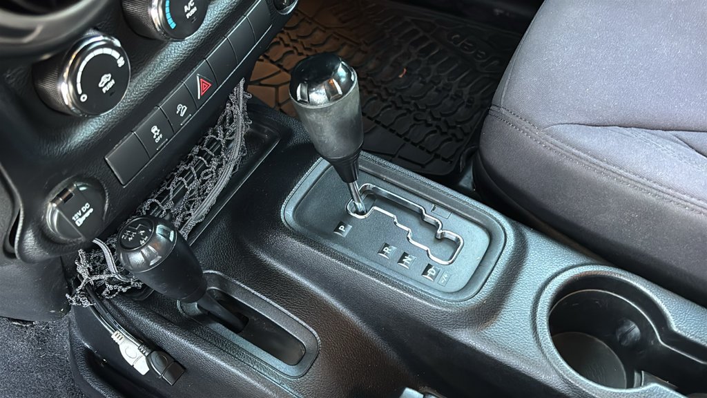 Used 2013 Billet Clearcoat Metallic Jeep Unlimited Sport image 16