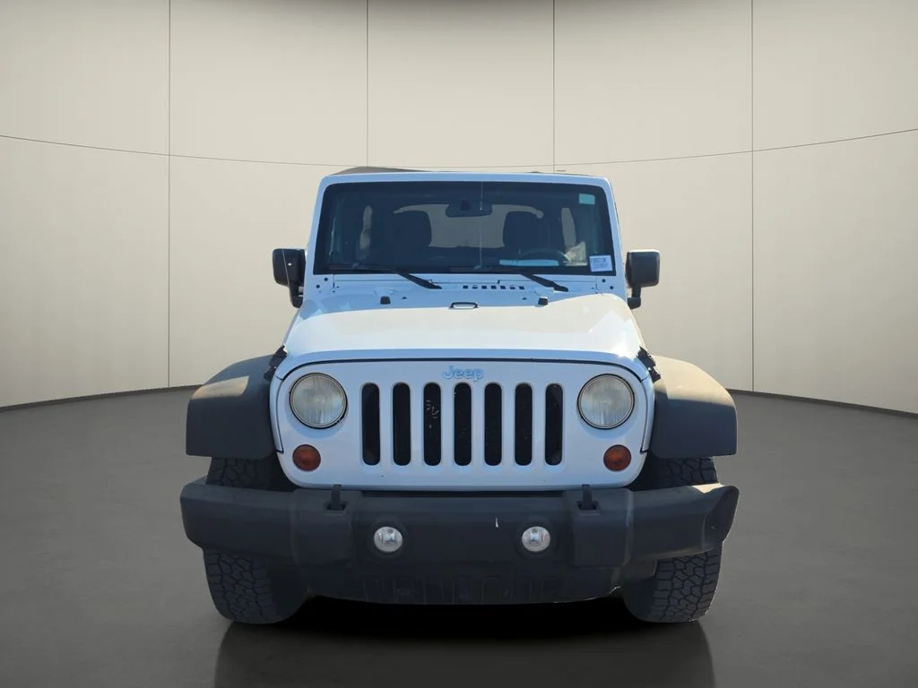 Used 2013 White Jeep Unlimited Sport image 2