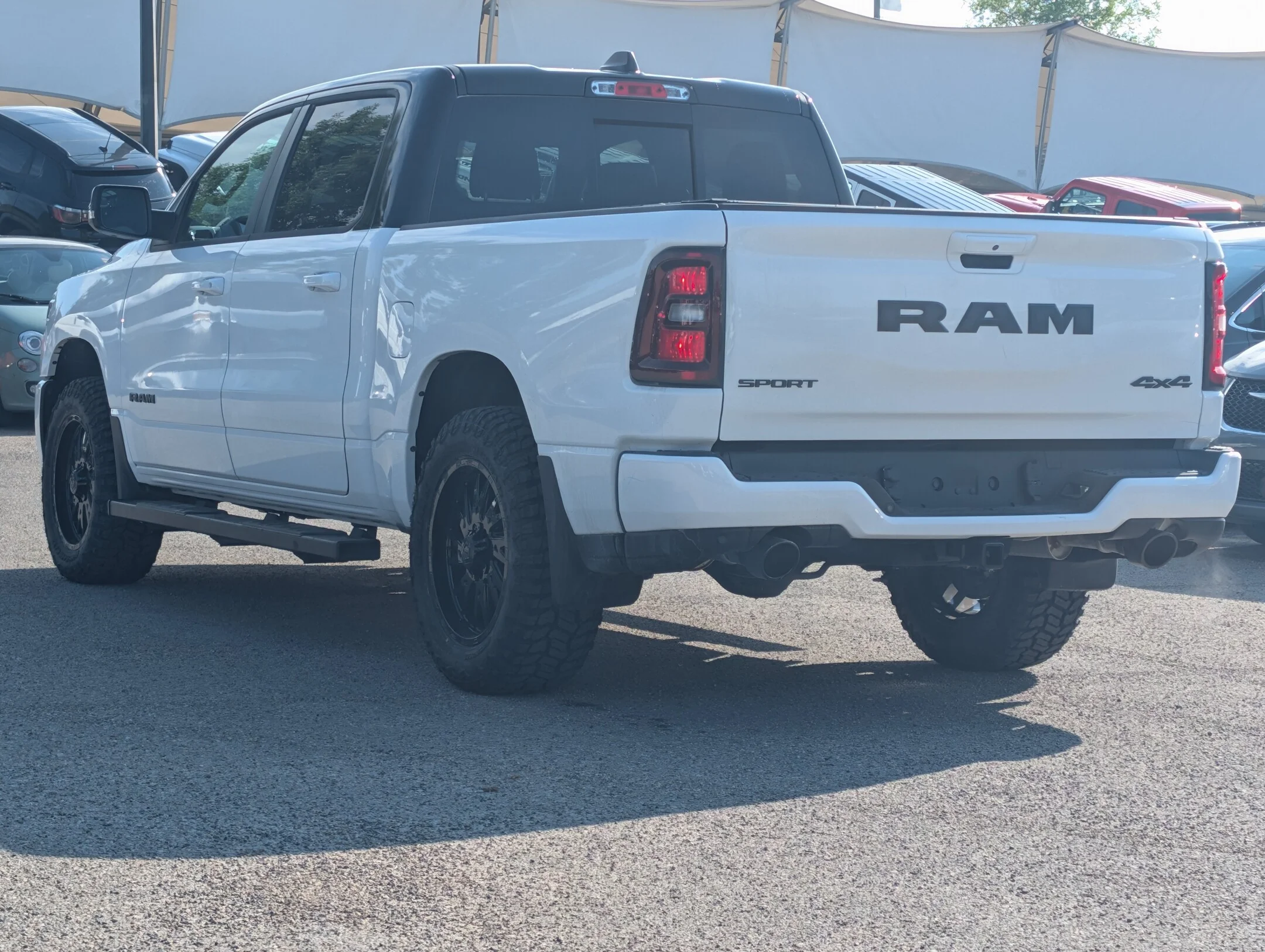 New 2026 White RAM Sport - - 2in Level Kit - Radar Renegade RT Tires - Tonneau Cover - Pano Sunroof & More! image 6